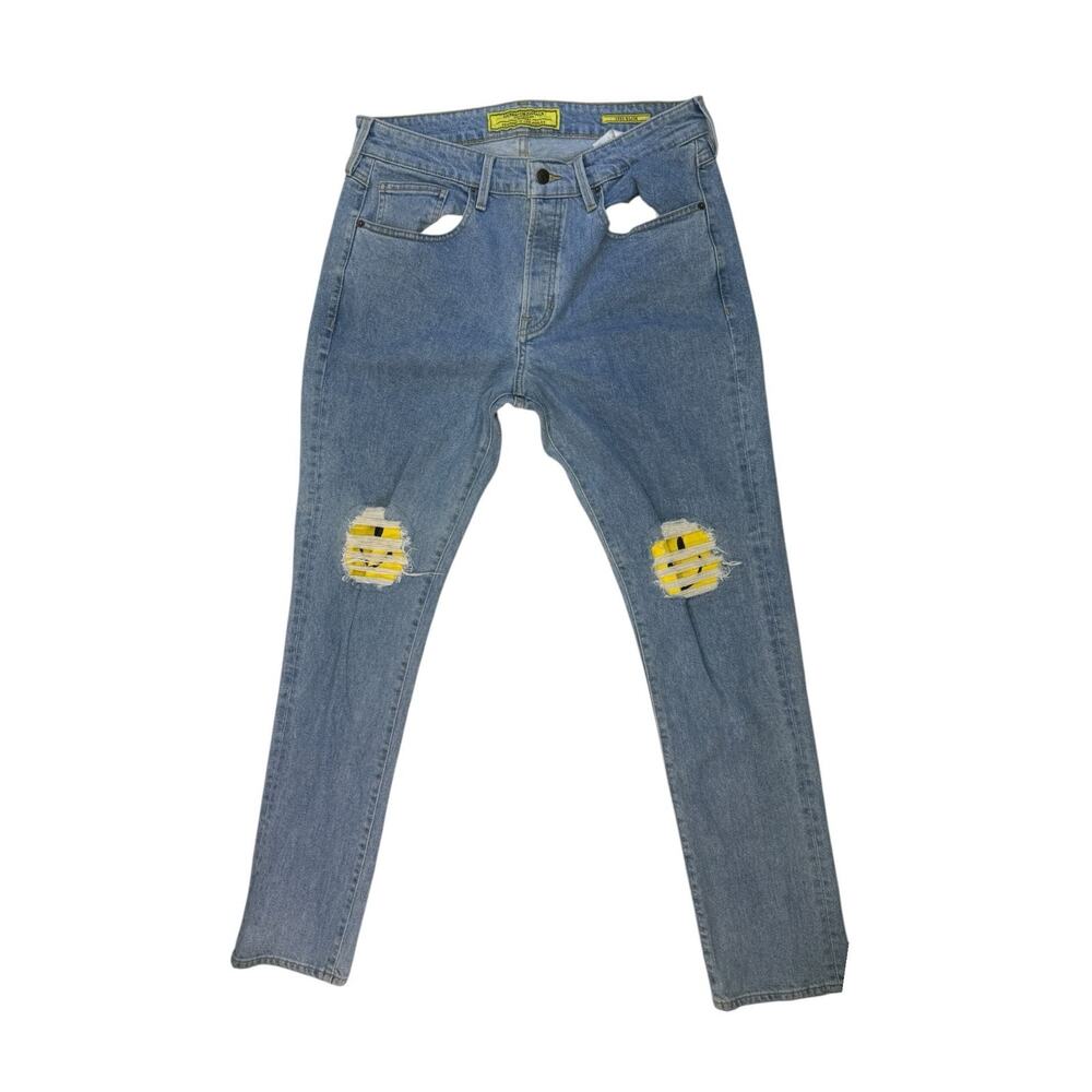 GUESS Originals x Chinatown Market Smiley 1981 Slim Distressed Jeans